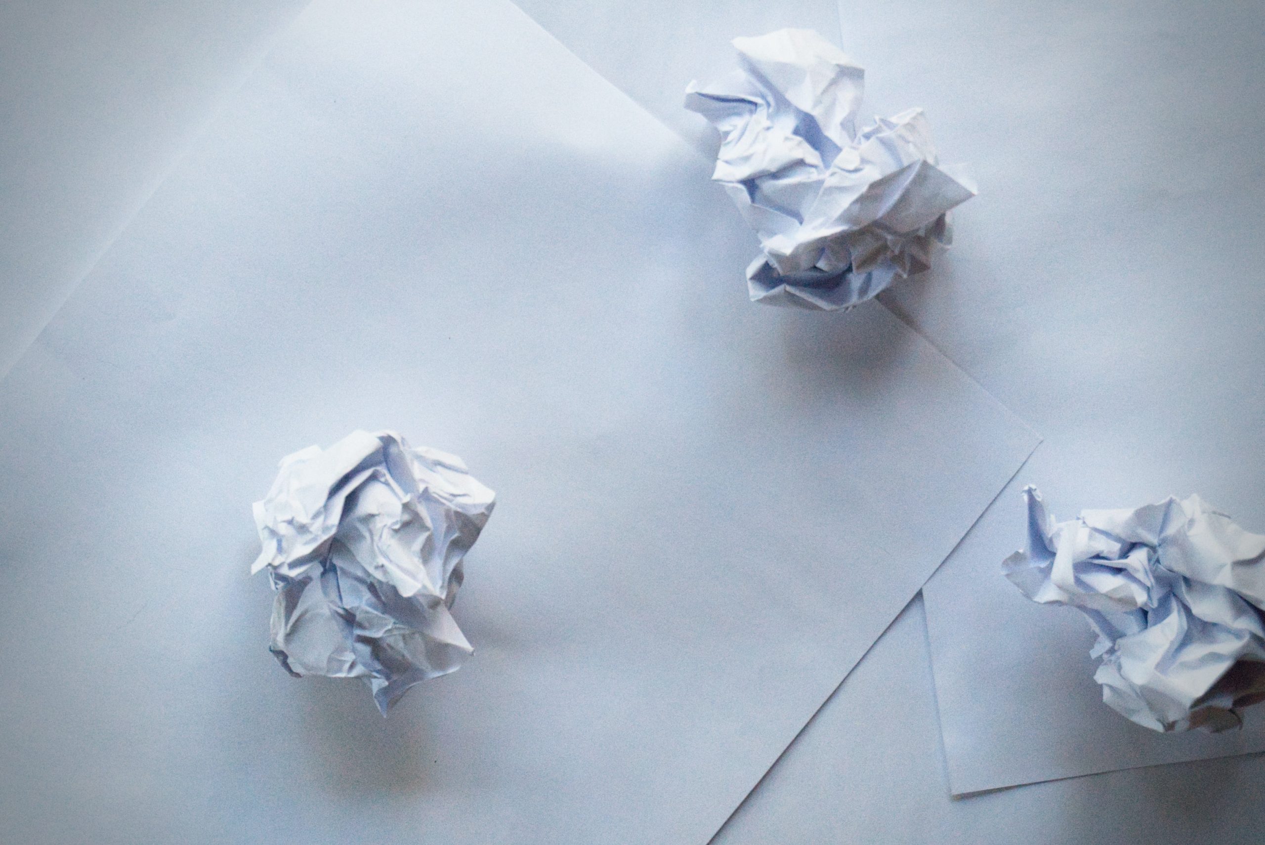 sheets of paper and crumpled paper